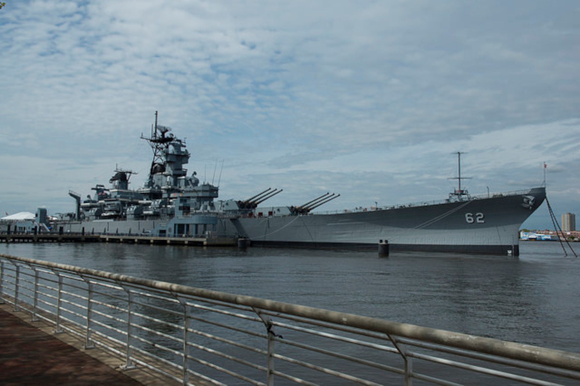 The Battleship New Jersey sits docked on the Camden, N.J. side of the Delaware River, May 1, 2015. The Battleship New Jersey is the most decorated Battleship in U.S. Naval history. (U.S. Air Force photo by Airman 1st Class Joshua King)