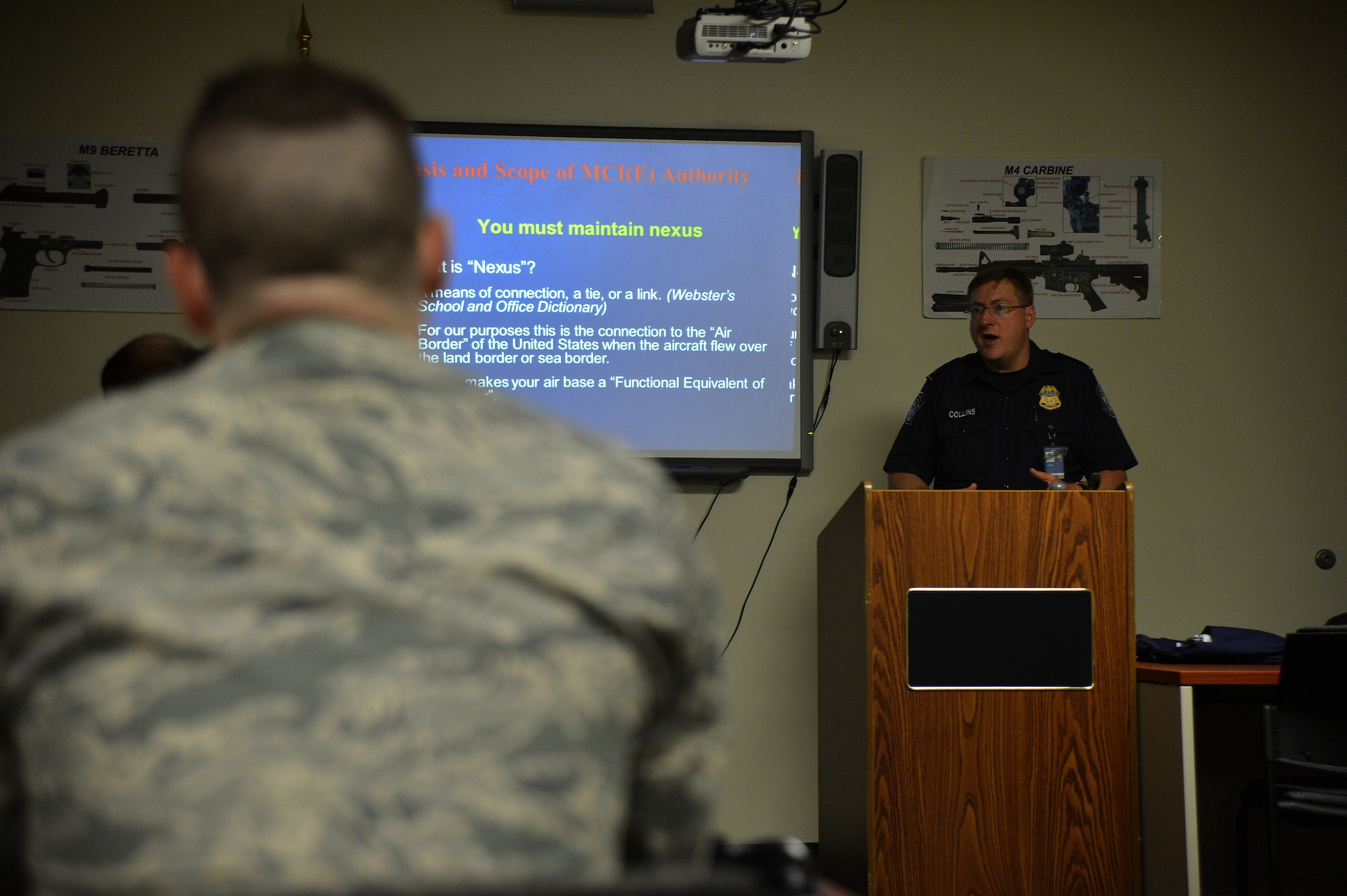 A U.S. Customs and Border Protection officer teaches the military customs inspector class to U.S. Air Force Airmen assigned to the 20th Security Forces Squadron at Shaw Air Force Base, S.C., April 28, 2015. The Airmen spent a full day in the class learning how to perform military customs inspections, what to look for, and what they can and can’t do. (U.S. Air Force photo by Airman 1st Class Michael Cossaboom/Released)