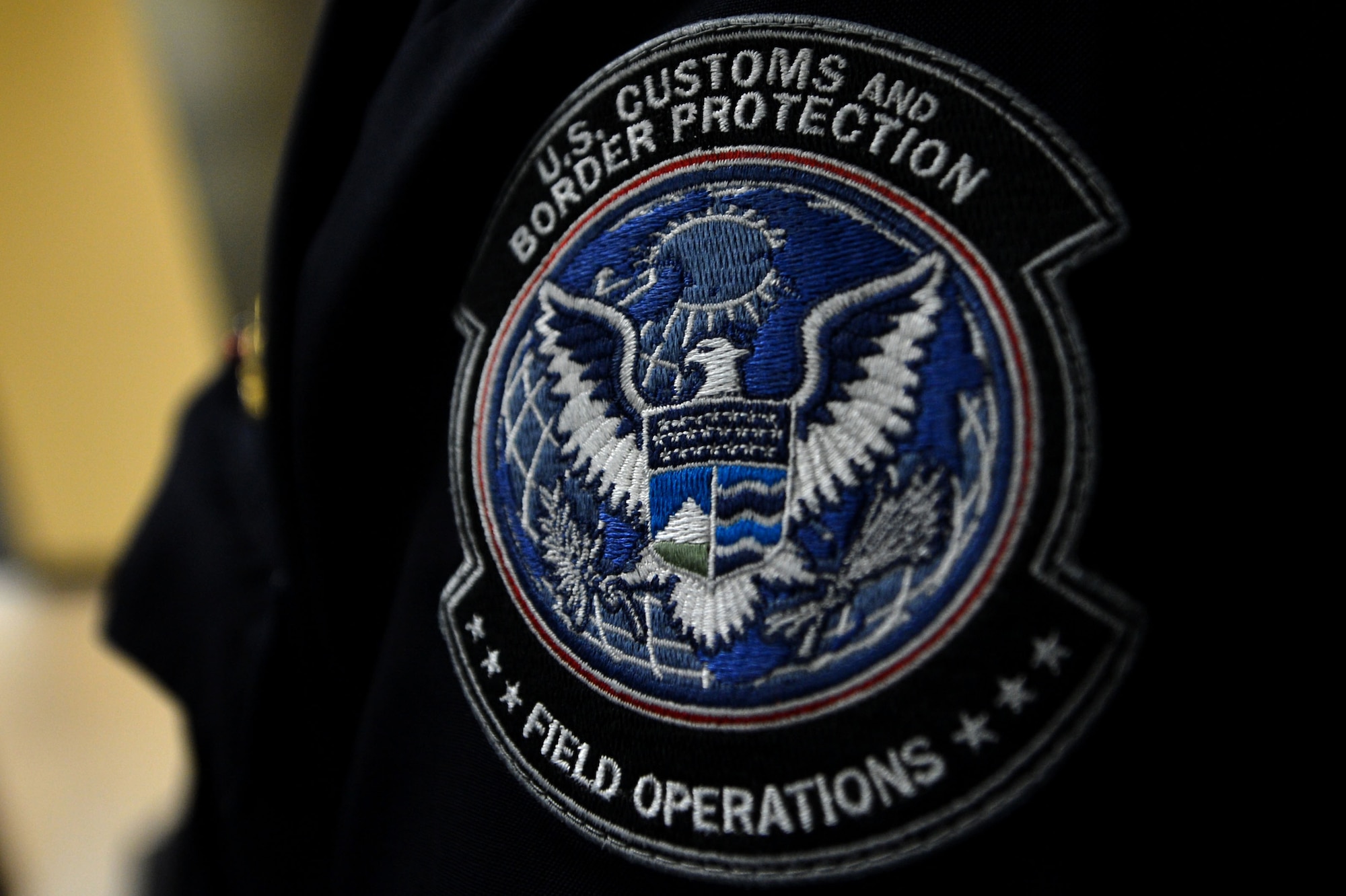 A U.S. Customs and Border Protection officer watchs an introduction video to the military customs inspector class at Shaw Air Force Base, S.C., April 28, 2015. When clearing military aircraft and personnel, security forces members are checking for any prohibited or restricted items such as alcohol, drugs, weapons, or plants. (U.S. Air Force photo by Airman 1st Class Michael Cossaboom/Released)