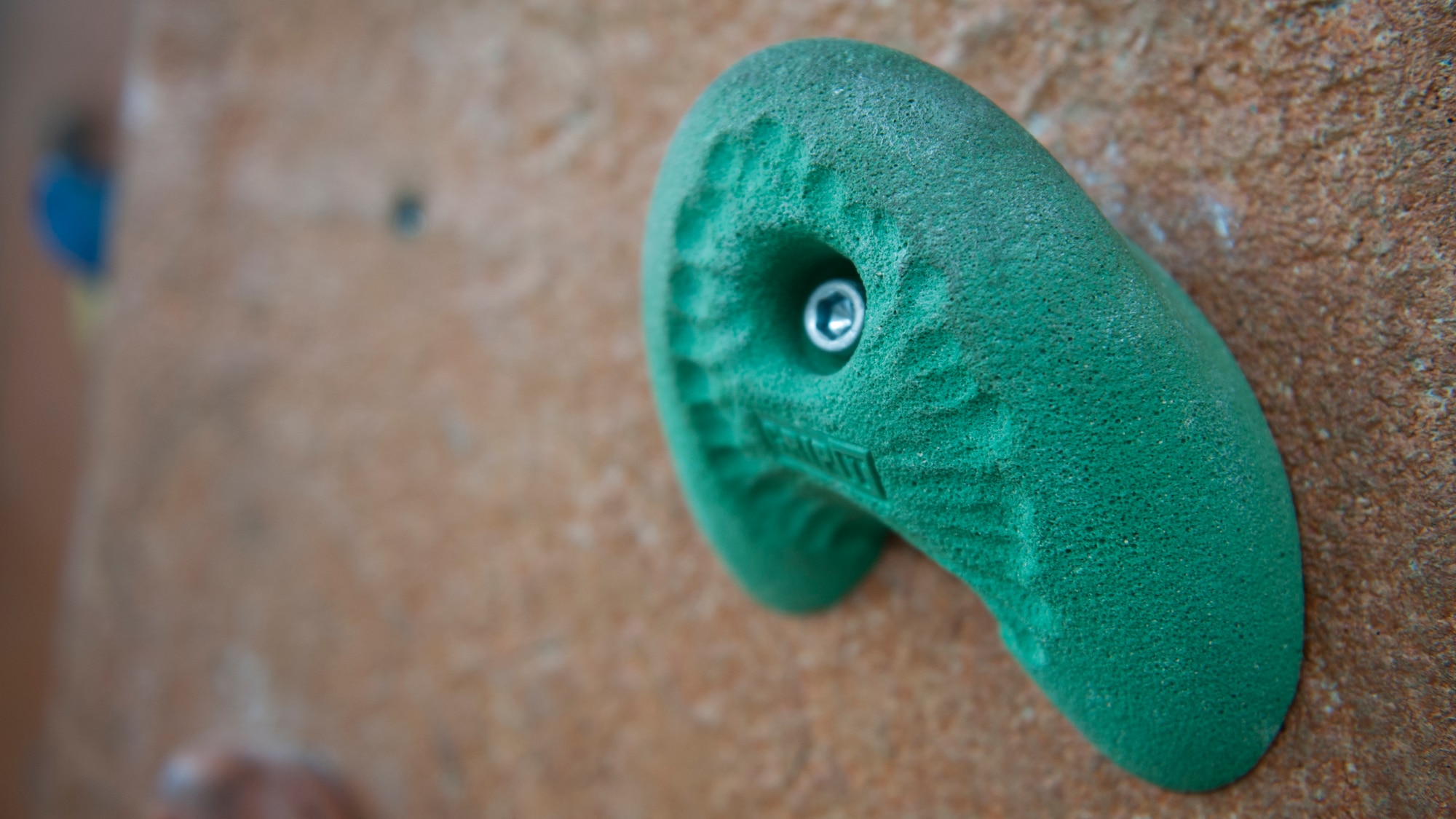 A hand grip sits attached to the indoor rock climbing wall inside the Outdoor Recreation facility May 5, 2015, at Dover Air Force Base, Del. Outdoor Recreation provides Team Dover personnel with equipment rentals, recreational trips and much more. (U.S. Air Force photo/Airman 1st Class Zachary Cacicia)