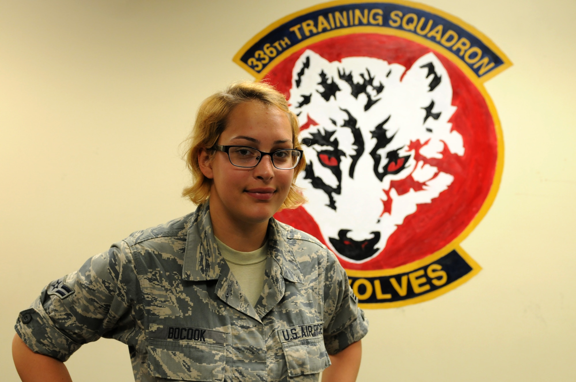 Airman 1st Class Amberlynn Bocook graduated from the cyber surety course in the 336th Training Squadron with a perfect score, April 30, 2015, Keesler Air Force Base, Miss. Bocook is a member of the Washington Air National Guard, and is continuing her training in the security plus course. (U.S. Air Force photo by Airman 1st Class Duncan McElroy)