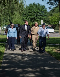 (From left to right) Holly Petraeus, Alan Wilson, Capt. Timothy Sparks and Col. Jeffrey DeVore chat in front of the Red Bank Club May 4, 2015 at Joint Base Charleston - Weapons Station, S.C. Patraeus, Consumer Financial Protection Bureau Senior Federal Executive Office of Servicemember Affairs and Wilson, South Carolina Attorney General, participated in a town hall meeting with Airmen and Sailors to educate them about their financial rights.  Sparks is the JB Charleston deputy commander and DeVore is the JB Charleston commander. (U.S. Air Force photo/Senior Airman Jared Trimarchi)