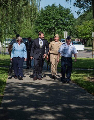 (From left to right) Holly Petraeus, Alan Wilson, Capt. Timothy Sparks and Col. Jeffrey DeVore chat in front of the Red Bank Club May 4, 2015 at Joint Base Charleston - Weapons Station, S.C. Patraeus, Consumer Financial Protection Bureau Senior Federal Executive Office of Servicemember Affairs and Wilson, South Carolina Attorney General, participated in a town hall meeting with Airmen and Sailors to educate them about their financial rights.  Sparks is the JB Charleston deputy commander and DeVore is the JB Charleston commander. (U.S. Air Force photo/Senior Airman Jared Trimarchi)