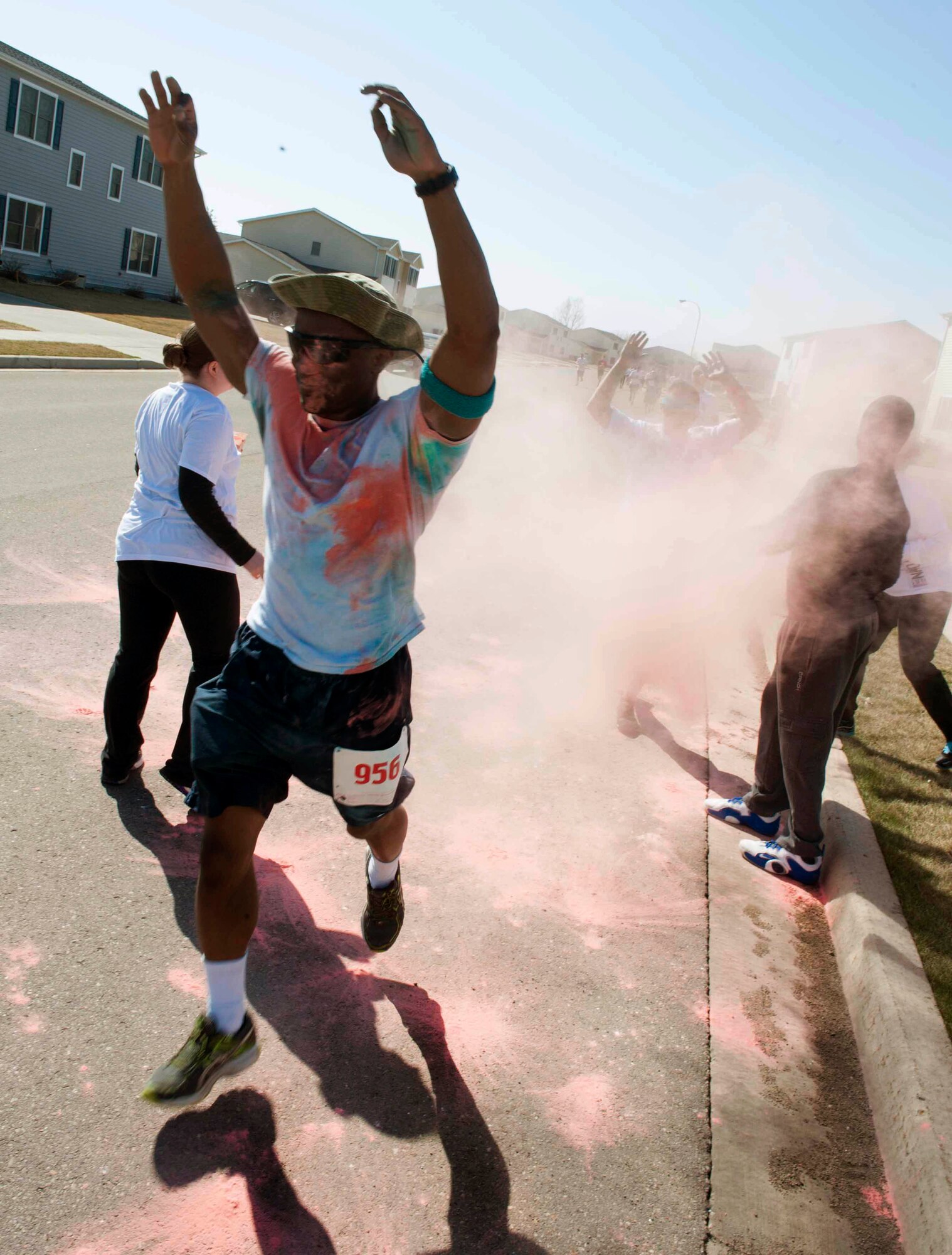Airmen and their families run the Mighty Medic Meltdown 5K/10K race on Minot Air Force Base, N.D., April 23, 2015. The 5th Medical Group hosted it in support of sexual assault prevention, child abuse prevention and alcohol awareness. (U.S. Air Force photo/Airman 1st Class Sahara L. Fales)