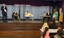 Lt. Col. David Cunningham, Pacific Air Forces Judge Advocate office chief of administrative law, makes his case to students from Aliamanu Elementary School during a mock trial for Law Day May 1, 2015. Law Day is a time to reflect on the role of law in the foundation of the country. In recognition of the event, Airmen from Joint Base Pearl Harbor-Hickam entertained the crowd of students with a brief re-telling of Jack and the Beanstalk, followed by a mock trial to determine if any crimes had been committed during Jack’s journey up and down the beanstalk. (U.S. Air Force photo by Tech. Sgt. Terri Paden)