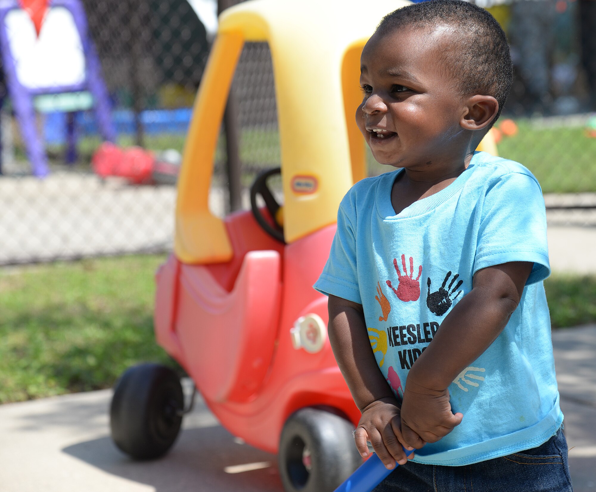 Justin Callender, son of Senior Airman Justin Callender, 81st Diagnostics and Therapeutics Squadron laboratory technician, dances at the Month of the Military Child Parent Day at the Keesler Child Development Center, April 30, 2015, Keesler Air Force Base, Miss. The CDC invited parents to participate in different activities with their children to celebrate the end of Month of the Military Child. (U.S. Air Force photo by Senior Airman Holly Mansfield)