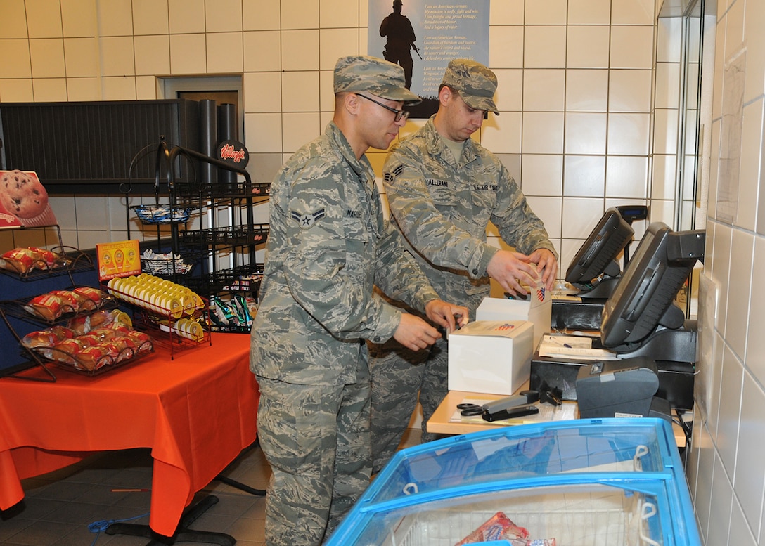 Senior Airman Zack Gallerani, 104th Services Flight, Barnes Air National Guard Base, Westfield, Mass., prepares a box lunch, May 5, 2015 Jawbone Flight Kitchen, Ramstein Air Base, Germany. The 104th Fighter Wing has deployed approximately 50 personnel to Ramstein Air Base, Germany, to integrate with active duty forces for deployed field training. (U.S. Air National Guard photo by Tech. Sgt. Melanie J. Casineau/Released)