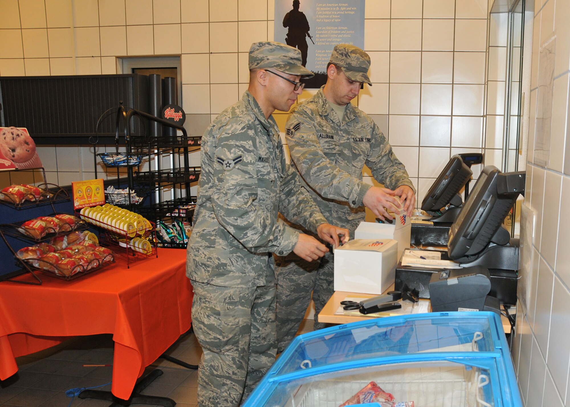 Senior Airman Zack Gallerani, 104th Services Flight, Barnes Air National Guard Base, Westfield, Mass., prepares a box lunch, May 5, 2015 Jawbone Flight Kitchen, Ramstein Air Base, Germany. The 104th Fighter Wing has deployed approximately 50 personnel to Ramstein Air Base, Germany, to integrate with active duty forces for deployed field training. (U.S. Air National Guard photo by Tech. Sgt. Melanie J. Casineau/Released)
