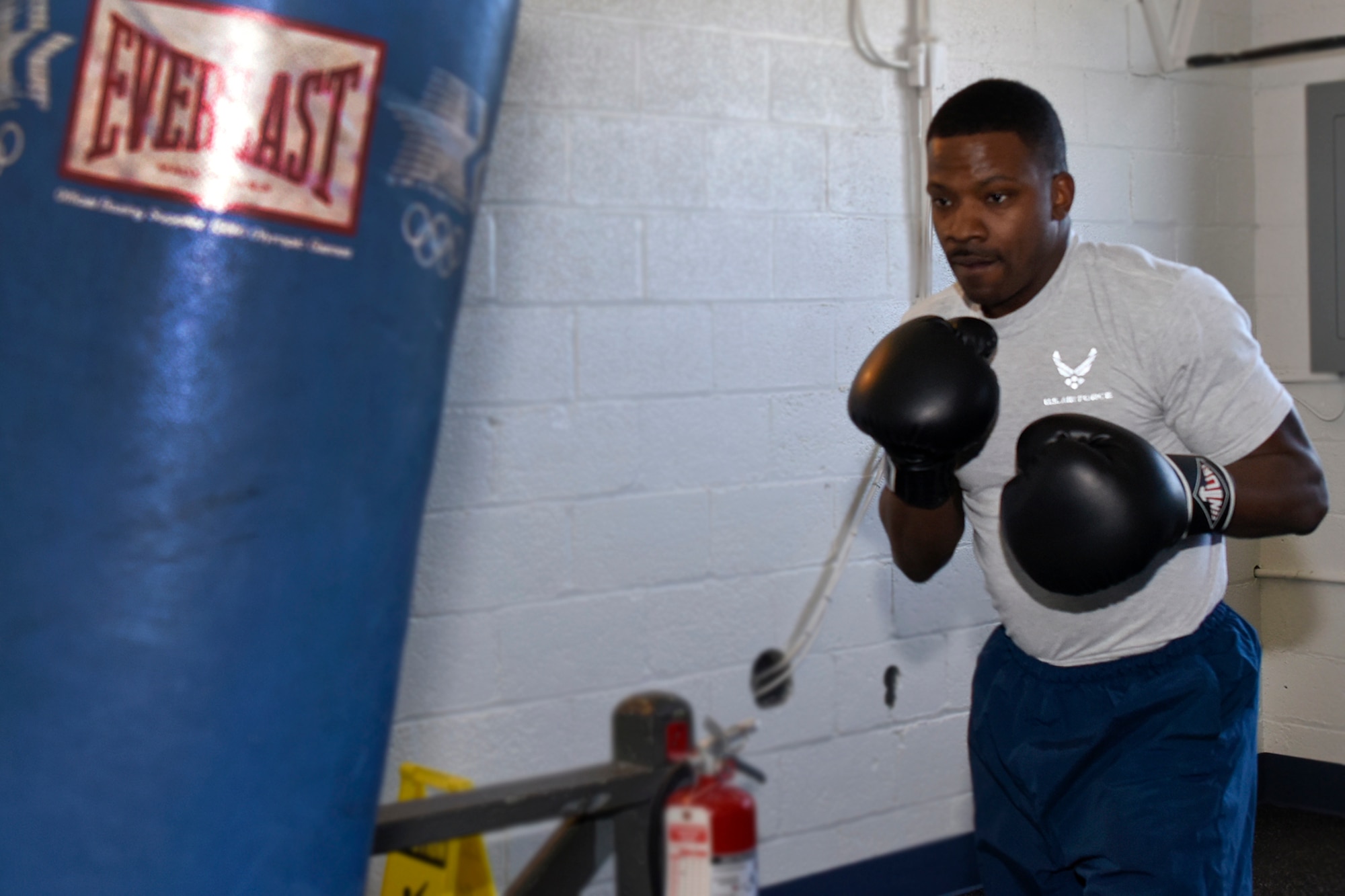 Airman 1st Class Onnie McSpadden works out with a heavy bag in the gym at Selfridge Air National Guard Base, Mich., April 28, 2015. McSpadden is a former boxer who now serves as a member of the 127th Wing, Michigan Air National Guard at Selfridge. (U.S. Air National Guard photo by Terry Atwell)