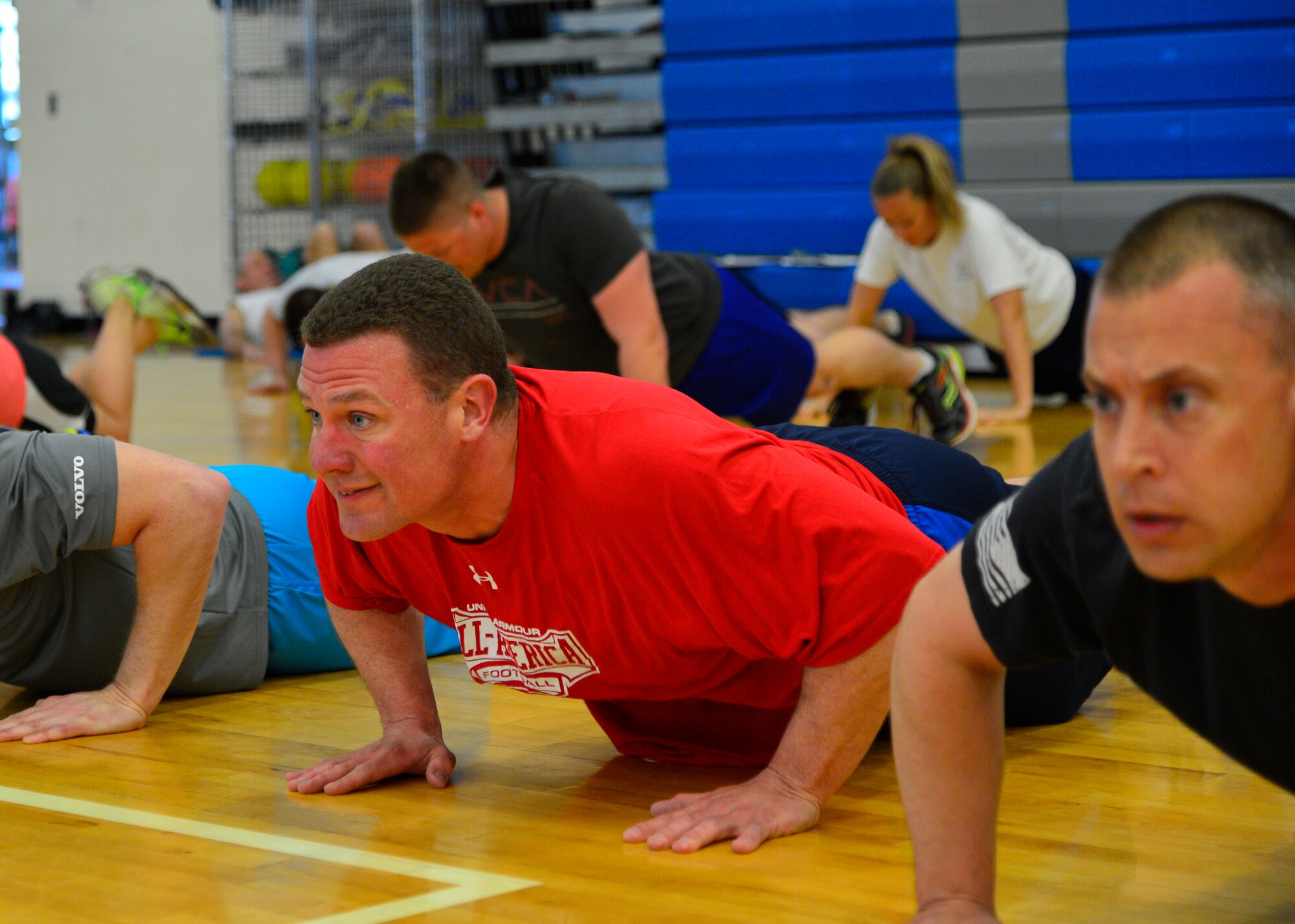 Master Sgt. Joey Therrien, 512th Maintenance Squadron engine repair supervisor, performs push-ups during a “90+” workout April 29, 2015, at the Fitness Center on Dover Air Force Base, Del. The workouts run between 30-35 minutes and are meant to push Airmen to their physical limits. (U.S. Air Force photo/Airman 1st Class William Johnson)