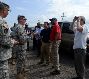 SOTO CANO AIR BASE, Honduras – U.S. Army Col. Kirk Dorr, Joint Task Force – Bravo commander, greets Ambassador James Nealon, U.S. Ambassador to Honduras (right), Congressman Marc Veasey (center right), representing Texas’ 33rd District, and Congressman Austin Scott (center left), representing Georgia’s 8th District,  during a congressional delegation tour May 4, 2015, at Soto Cano Air Base, Honduras. The delegation came to learn about JTF-B’s support to the broader U.S. and partner nation stabilization efforts in Central America. (U.S. Air Force photo by Staff Sgt. Jessica Condit) 