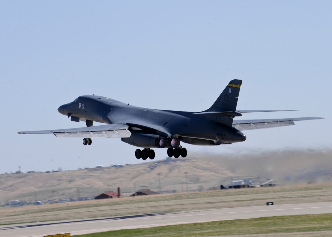 A B-1 bomber assigned to the 37th Bomb Squadron takes off at Ellsworth Air Force Base, S.D., to participate in a Green Flag 15-07 exercise at the U.S. Army National Training Center at Fort Irwin, Calif., April 29, 2015. The B-1 can rapidly deliver massive quantities of precision and non-precision weapons against any adversary, anywhere in the world, at any time. (U.S. Air Force photo by Senior Airman Anania Tekurio/Released)