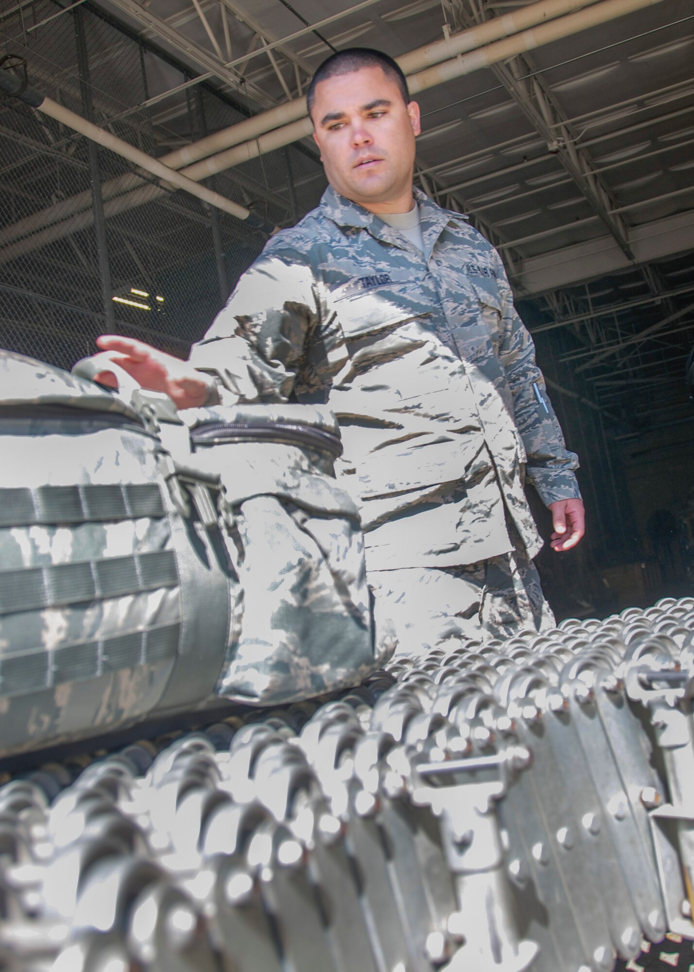 Staff Sgt. Joshua Taylor, 419th Logistics Readiness Squadron, helps process the luggage of nearly 300 reservists prior to their departure from Eglin Air Force Base, Fla., after two weeks of training. (U.S. Air Force photo/Staff Sgt. Crystal Charriere)