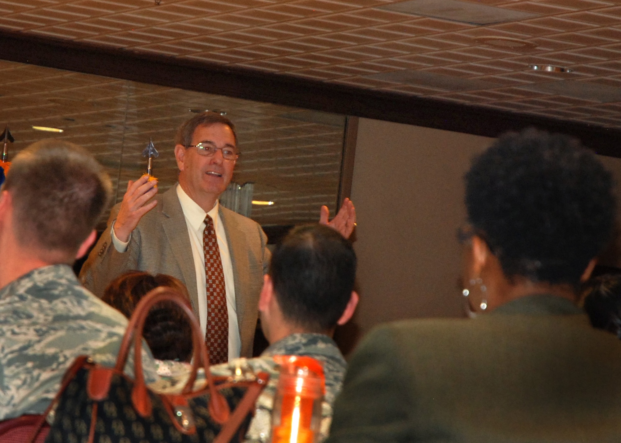 PETERSON AIR FORCE BASE, Colo. -- Retired Gen. Stephen Lorenz, former Air Force Director of Budget and current president of the Air Force Academy endowment, shares lessons and experiences from almost 40 years in the Air Force. Lorenz delivered the keynote address at the Pikes Peak chapter of the American Society of Military Comptrollers professional development institute April 29 at The Club. The event was open to defense financial managers assigned to Schriever, Peterson and Buckley Air Force bases, Cheyenne Mountain Air Force Station, the U.S. Air Force Academy and Fort Carson. (U.S. Air Force photo by Dave Smith)