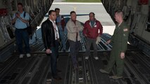 Staff Sgt. Zach Odom, 3d Airlift Squadron loadmaster, right, talks with a group of touring civilian pilots during the 2015 Dover Air Force Base Mid-Air Collision Avoidance Fly-in May 2, 2015 onboard a C-17A Globemaster III on Dover AFB, Del. The pilots toured this C-17 to better understand how military aircraft operate. (U.S. Air Force photo/Airman 1st Class Zachary Cacicia)