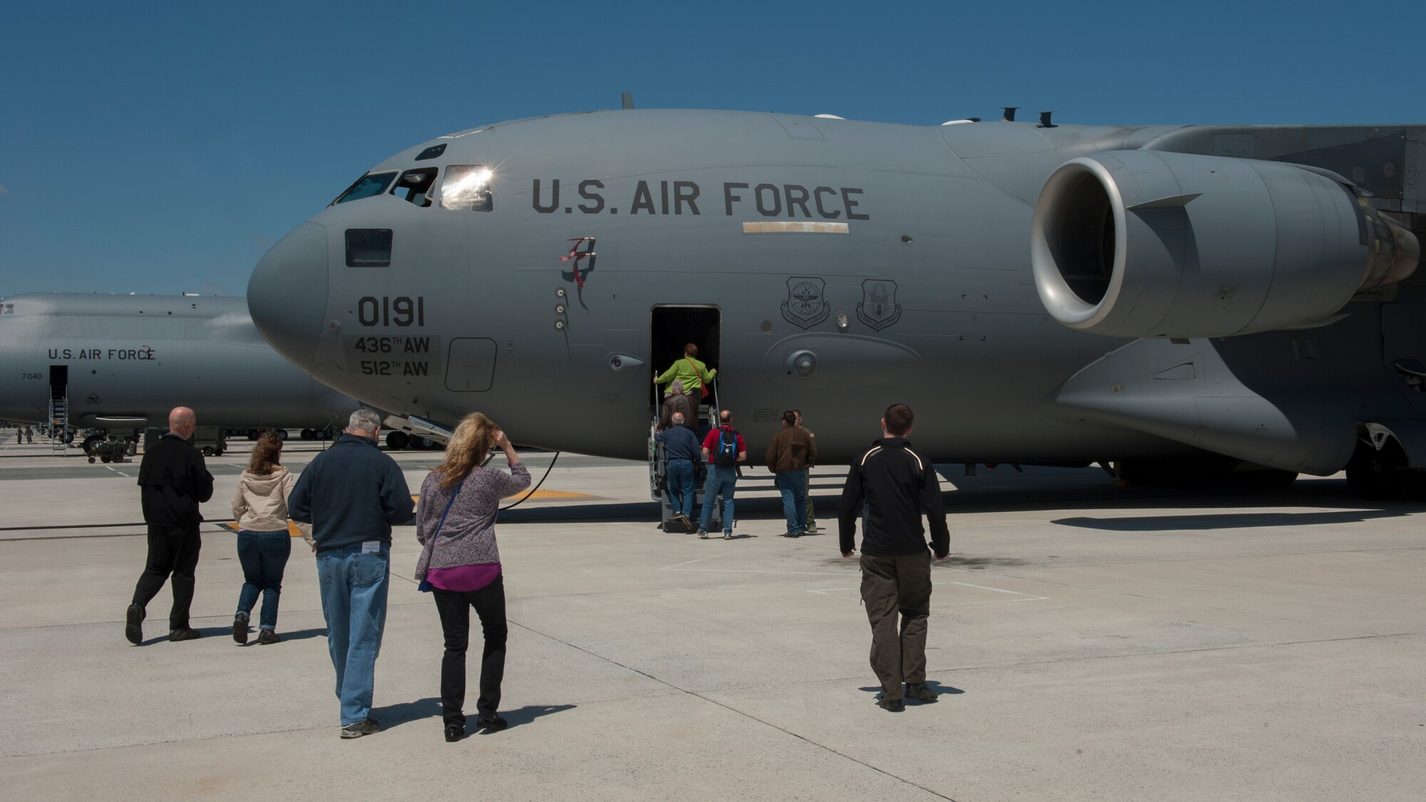 Touring civilian general aviation pilots board a C-17A Globemaster III during the 2015 Dover Air Force Base Mid-Air Collision Avoidance Fly-in May 2, 2015 on Dover AFB, Del. This C-17 was on static display for the pilots to tour. (U.S. Air Force photo/Airman 1st Class Zachary Cacicia)