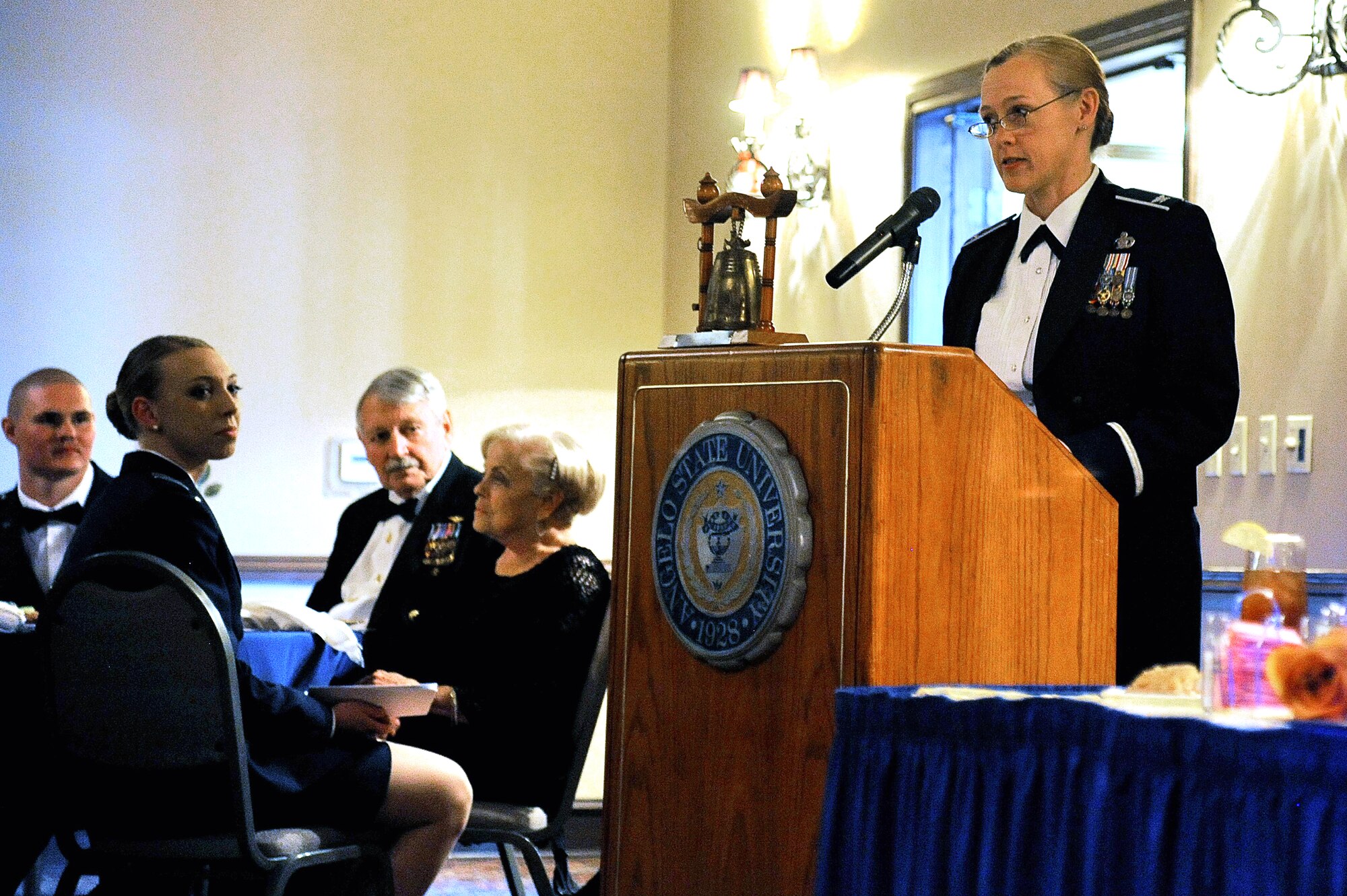 U.S. Air Force Col. Kimberlee P. Joos, 17th Training Wing Commander, speaks as the honored guest during the 45th Annual 847th Cadet Wing Dining Out Awards Banquet at the LeGrande Alumni Center in San Angelo, Texas May 1, 2015. Various presenters handed out numerous awards during the banquet which also provided an occasion for the cadets to meet socially at a formal military function. (U.S. Air Force photo/Tech. Sgt. Austin Knox)
