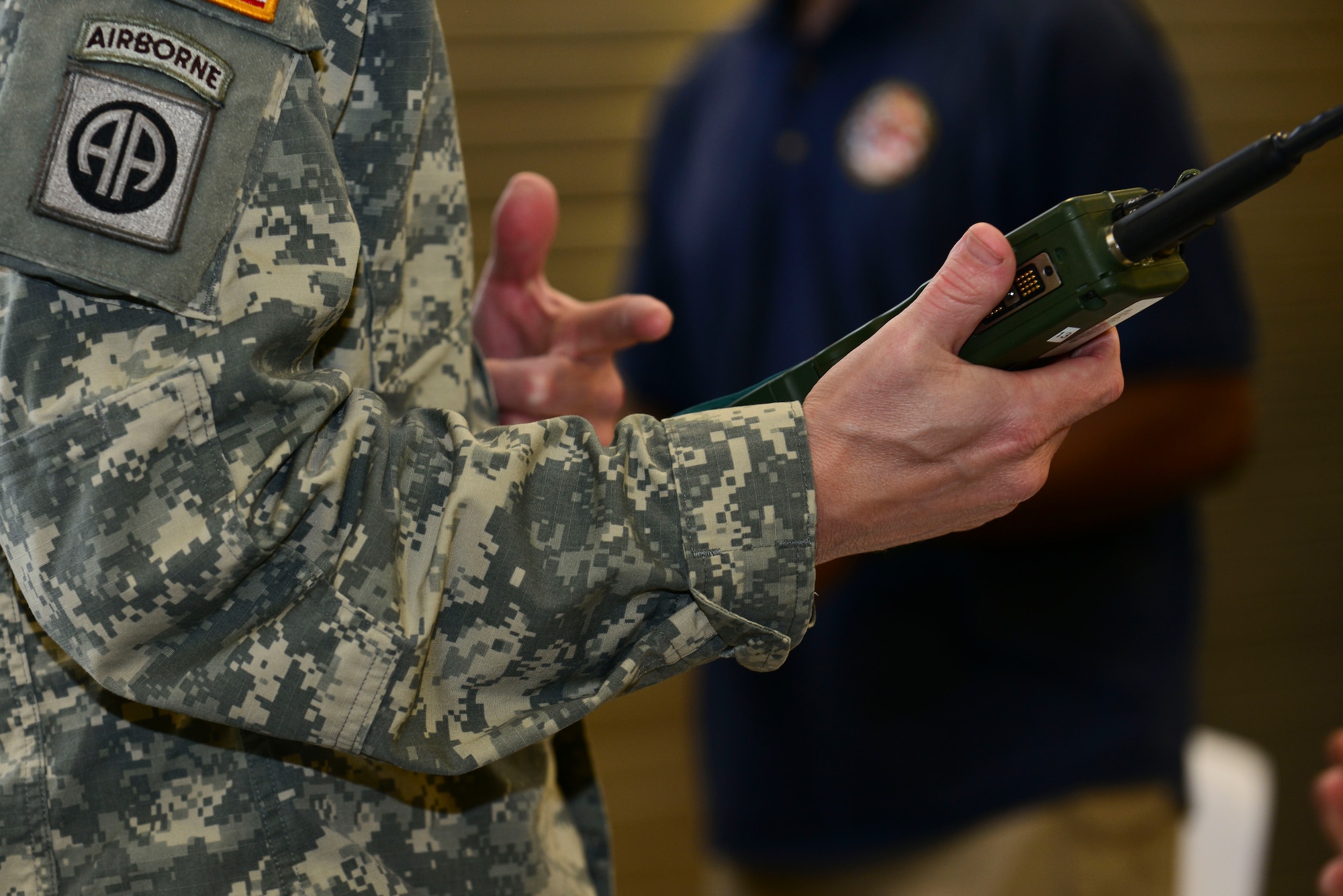 U.S. Army Maj. Jason Engelbrecht, Joint Task Force-Civil Support future operations planner, picks up a radio in a gear collection line during exercise Vibrant Response 15 at Fort Eustis, Va., April 30, 2015. VR 15 is a domestic disaster response exercise that tests federal civilian and military response to domestic crises. (U.S. Air Force photo by Senior Airman Kimberly Nagle/Released)  
