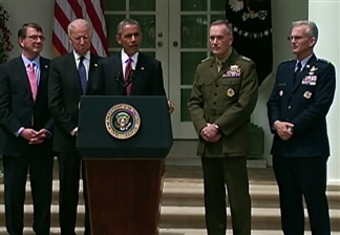 Defense Secretary Ash Carter, far left, listens as President Barack Obama nominates Marine Corps Gen. Joseph F. Dunford Jr. to serve as the next chairman of the Joint Chiefs of Staff and Air Force Gen. Paul J. Selva to serve as the next vice chairman during an announcement at the White House in Washington, D.C., May 5, 2015. Vice President Joe Biden, second from left, participated in the event. If the Senate confirms the nominations, Dunford would succeed Army Gen. Martin E. Dempsey and Selva would succeed Navy Adm. James A. Winnefeld Jr.