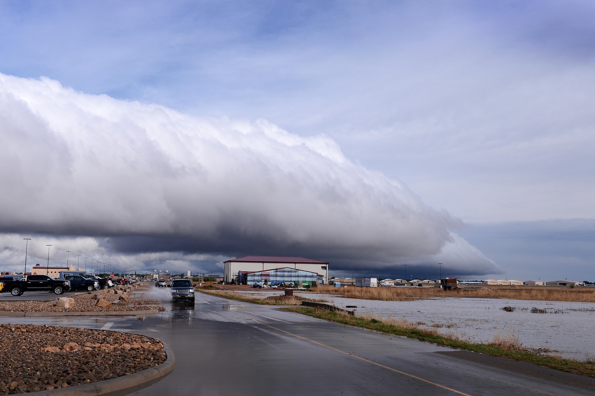 Heavy rain clouds loom over the local area May 5, 2015, at Cannon Air Force Base, N.M. Flood and water damage is still being assessed after the abnormally heavy rainfall. (U.S. Air Force photo/Staff Sgt. Matthew Plew) 