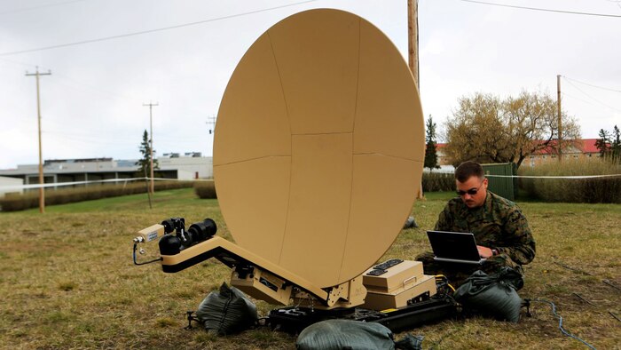 Sgt. Timothy Shirey, the data chief with 1st Air Naval Gunfire Liaison Company, evaluates and checks signal strength on a Rapid Response Kit during Exercise Maple Resolve 15 aboard Camp Wainwright Canadian Maneuver Training Center, Alberta, May 3, 2015. The Marines used the exercise to develop a knowledge platform to train for future operations and integrate with allied forces. (U.S. Marine Corps photo  by Cpl. Owen Kimbrel)