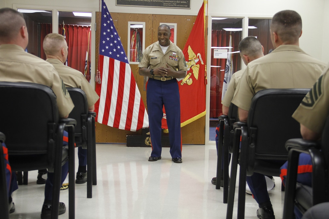 Sergeant Major Johnnie Hughes, the outgoing Marine Corps Recruiting Station Kansas City sergeant major, speaks to those in attendance at the conclusion of RS Kansas City's sergeant major relief and appointment ceremony at the Kansas City Military Entrance Processing Station April 17, 2015. Hughes, a former drill instructor, spoke of his time as the RS' sergeant major as a learning experince, witnessing first hand the sacrifices and challenges, but also rewards, recruiters must make to find quality men and women who wish to serve in the Marine Corps. 