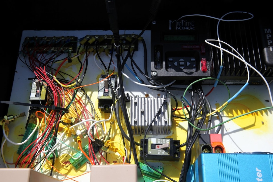 Gunnery Sgt. Michael Ott, the navigational aids chief for Marine Air Control Squadron 4, Detachment Alpha, built a solar-powered generator for the Tactical Air Navigation system to be tested during Exercise Balikatan 2015. The total amount of time to build this invention was approximately four months. (U.S. Marine Corps photo by Sgt. Brady Wood)