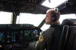 Capt. Garrett Caponetti pilots the C-27J Spartan during a familiarization flight over New England Friday, Oct. 22, 2010. Caponetti is currently assigned to the 118th Airlift Squadron at Bradley Air National Guard Base in East Granby, Conn., and was among the first of the Flying Yankees to fly the new light cargo aircraft that visited the base to give members there a glimpse of their future mission.
