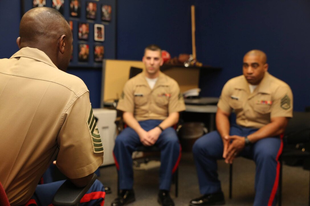 Sergeant Major Samuel Heyward Jr., Sergeant Major Marine Corps Recruiting Command, spoke with Sergeant Richard H. Hayes and Staff Sergeant Christian V. Harris at Recruiting Sub-Station South East Indianapolis during a Recruiting Station Indianapolis visit April 27, 2015. Photo by LCpl Zachery B. Martin 