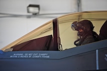 Lt. Col. Christine Mau, 33rd Operations Group deputy commander, prepares to take her first flight in the F-35A on Eglin Air Force Base, Florida, May 5, 2015. Mau, who previously flew F-15E Strike Eagles, made history as the first female F-35 pilot in the program. (U.S. Air Force photo/Staff Sgt. Marleah Robertson)