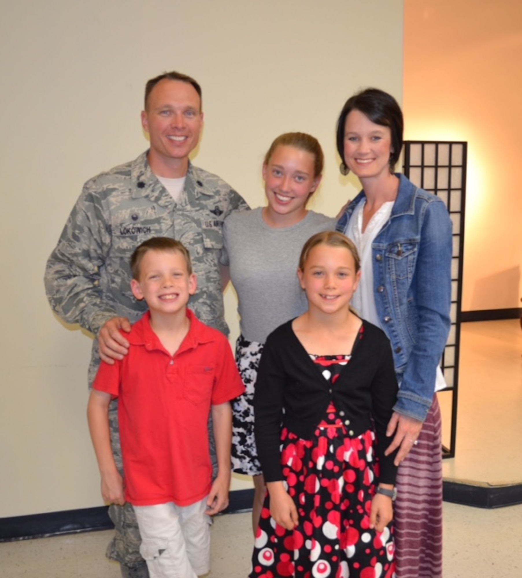 Lt. Col. Luke Lokowich, the 5th Reconnaissance Squadron commander, his wife Lindsey and his chidren Avery, Jacob, and Abigail, at Osan Air Base, South Korea. Fifteen years ago, Lokowich’s lost his wife, JoAnne when she suffered a cerebral hemorrhaging due to an aneurism. With the support of his family and friends, and healthy coping methods, Lokowich has been resilient, and has since remarried and still celebrates JoAnne’s life. (Courtesy photo)