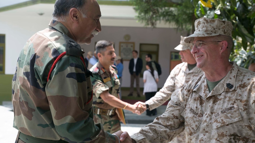 Sgt. Maj. Lee D. Bonar greets Maj. Gen. J S Sandhu May 5 at Tribhuvan international airport. Nepal was struck by a 7.8 magnitude earthquake April 25, since then, an international humanitarian assistance and disaster relief operation has been taking place in Nepal. The Nepalese Government requested the U.S. Government’s help after the earthquake. USAID is a U.S. Government agency that gives civilian foreign aid in time of natural disaster. Sandhu is the Indian Army Task Force commander. Bonar is the sergeant major of III Marine Expeditionary Force. (U.S. Marine Corps photo by Cpl. Isaac Ibarra/Released)