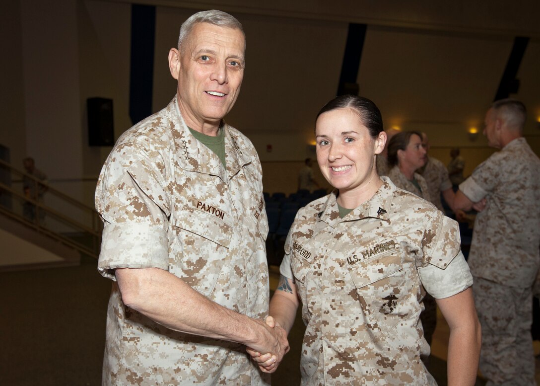 The Assistant Commandant of the U.S. Marine Corps, Gen. John M. Paxton, Jr., left, poses for a photo while visiting Marine Corps Forces Central Command at MacDill Air Force Base, Tampa, Fla., May 5, 2015. (U.S. Marine Corps photo by Cpl. Tia Dufour/Released)