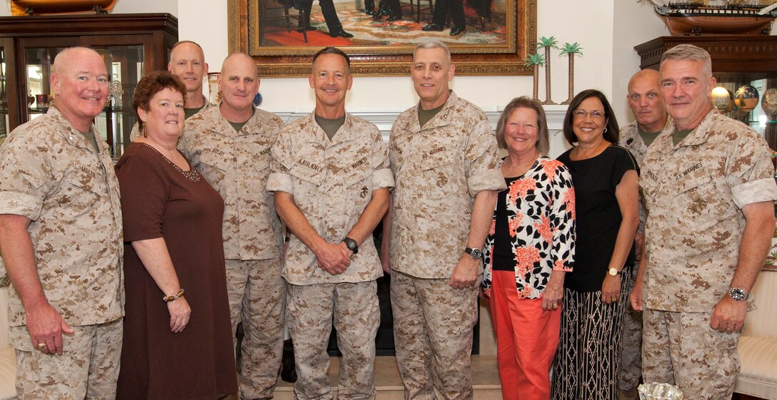 The Assistant Commandant of the U.S. Marine Corps, Gen. John M. Paxton, Jr., center right, poses for a photo while visiting Marine Corps Forces Central Command at MacDill Air Force Base, Tampa, Fla., May 5, 2015. (U.S. Marine Corps photo by Cpl. Tia Dufour/Released)