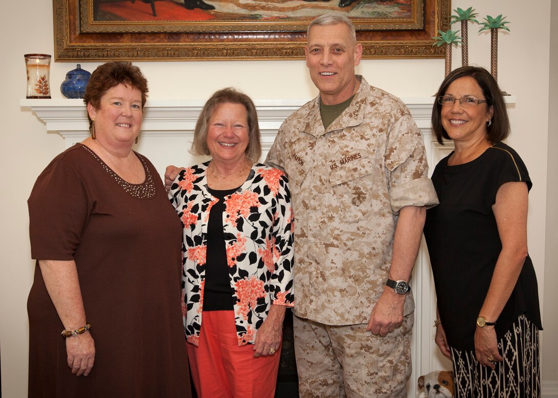 The Assistant Commandant of the U.S. Marine Corps, Gen. John M. Paxton, Jr., center right, poses for a photo while visiting Marine Corps Forces Central Command at MacDill Air Force Base, Tampa, Fla., May 5, 2015. (U.S. Marine Corps photo by Cpl. Tia Dufour/Released)