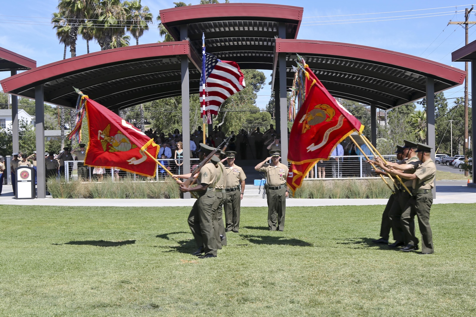 U.S. Marine Corps Col. Eric B. Kraft, off going commanding officer, Headquarters Regiment, 1st Marine Logistics Group, 1 Marine Expeditionary Force, and on coming commanding officer, Col. Phillip N. Frietze salute the colors during the Change of Command Ceremony for Headquarters Regiment aboard Camp Pendleton Calif., May 1, 2015. The Change of Command Ceremony for Headquarters Regiment showcased the passing of command from Col. Eric B. Kraft to Col. Phillip N. Frietze. (U.S. Marine Corps photo by Lance Cpl. Lauren Falk/Released)