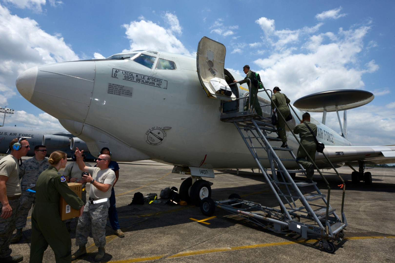 In this photo file, U.S. Air Force Airmen from the 961st Airborne Air Control Squadron and Aircraft Maintenance Unit discuss pre-flight information while Philippine Air Force (PAF) air battle managers board a 961st AACS E-3 Sentry Airborne Warning and Control System (AWACS) during exercise Balikatan 2015 on Clark Air Base, Philippines, April 23. This exercise marks the first time in history that PAF air battle managers have controlled other aircraft while onboard the AWACS. Since the exercise began, April 20, the 961st AACS has integrated 20 PAF weapons controllers during their missions to provide them with first-hand experience using the aircraft’s systems. The 961st AACS is stationed at Kadena Air Base, Japan. 