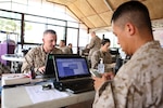 In this photo, U.S. Marine Corps Capt Mathew Phelps works in the Joint Task Force (JTF) 505 Joint Operations Command Center (FWD) on May 6, 2015. The Nepalese Government requested the U.S. Government’s assistance after a 7.8 magnitude earthquake struck the country, April 25, 2015. U.S. Marines from III Marine Expeditionary Force have come together with other U.S. services to form JTF-505. JTF-505 works in conjunction with USAID and the international community to provide unique capabilities to assist Nepal. 