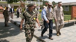KATHMANDU, Nepal (May 5, 2015) - Lt. Gen. John E. Wissler meets with Alfonso Lenhardt and members of the United States Agency of International Development at Tribhuvan international airport before they depart to village Bhirkuna Deurali, Nepal. After Nepal was struck by a 7.8 magnitude earthquake Wissler and USAID members distribute supplies including tarps, sleeping systems and water purification solution. The Nepalese Government requested the U.S. Government's help after the earthquake. USAID is a U.S. Government agency that gives civilian foreign aid in time of natural disasters. Wissler is the commanding general of III Marine Expeditionary Force. 