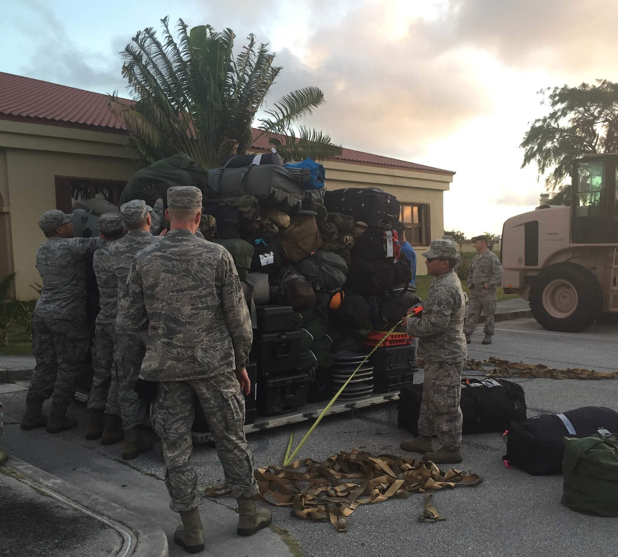 Members of the 36th Contingency Response Group load a baggage pallet prior to departing for Kathmandu, Nepal, Andersen Air Base, Guam, May 5, 2015. The CRG will join U.S. Department of State and U.S. Agency for International Development led humanitarian assistance and disaster relief operations in support of the Government and Armed Forces of Nepal. (U.S. Air Force photo by Maj. Ashley Conner/Released)