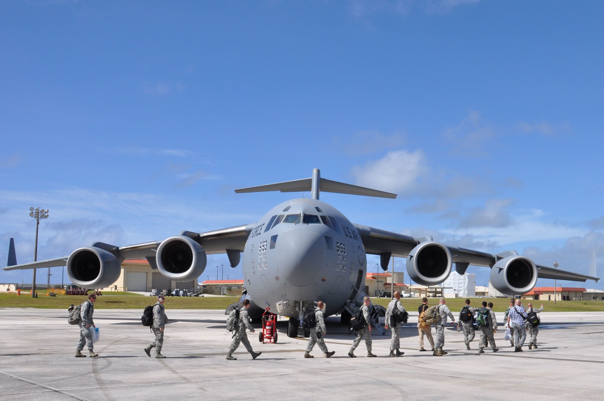 Members of the 36th Contingency Response group board a C-17 Globemaster III destined for Kathmandu, Nepal, at Andersen Air Force Base, Guam, May 4, 2015. The CRG will join U.S. Department of State and U.S. Agency for International Development led humanitarian and disaster relief operations in support of the government and armed forces of Nepal. (U.S. Air Force photo by Maj. Ashley Conner/Released)