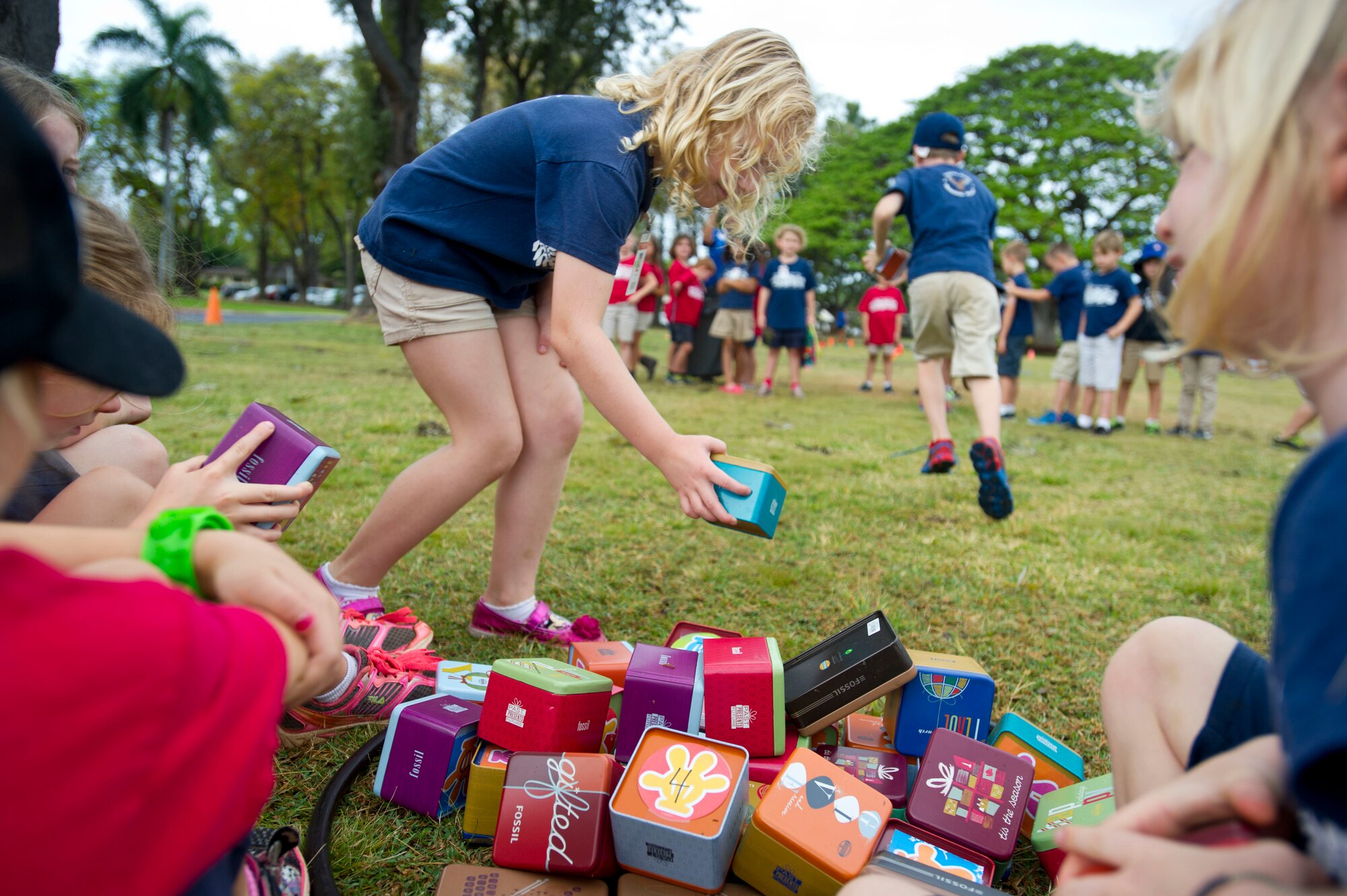 First grade students of Hickam Elementary School play a fitness game inspired by Dr. Seuss’ “How the Grinch Stole Christmas,” as part of Teacher Appreciation Week on Joint Base Pearl Harbor-Hickam, Hawaii, May 5-8. To celebrate the teachers and offer them well-deserved time off, Airmen volunteered their time to supervise the kindergarten through sixth grade students as their teachers enjoyed the Hickam Historical Tour, learning about the history of the base and the Hickam community. (U.S Air Force photo by 2nd Lt. Kaitlin Daddona/Released)
