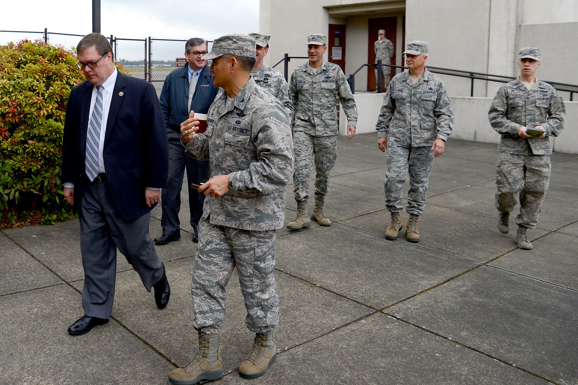 Congressman Deny Heck (left), WA-10, tours the McChord tower and tower simulator May 6, 2015, at Joint Base Lewis-McChord, Wash. Heck was briefed on McChord Field air traffic management as well as ongoing construction projects. (U.S.  Air Force photo \ Staff Sgt. Tim Chacon)
