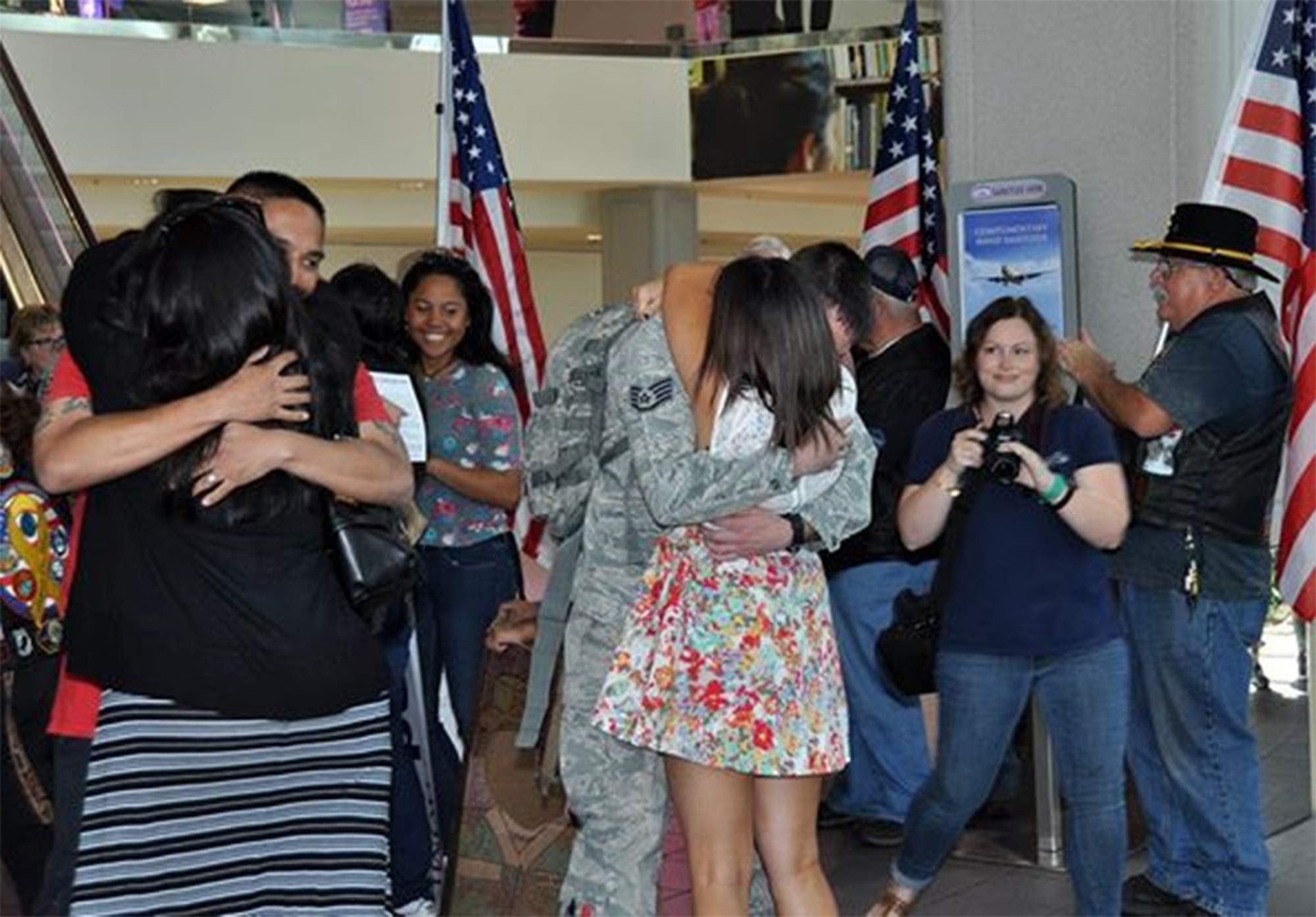 Members of Team Travis, military families and the Patriot Guard Riders of Sacramento welcome Security Forces Defender arriving at to the Sacramento International Airport after six-month deployments to Southwest Asia, May 3, 2015. The returning Airmen were from Travis Air Force Base’s 349th and 60th Security Forces Squadrons. (U.S. Air Force courtesy photo/Staff Sgt. Cindy G. Alejandrez/Released)