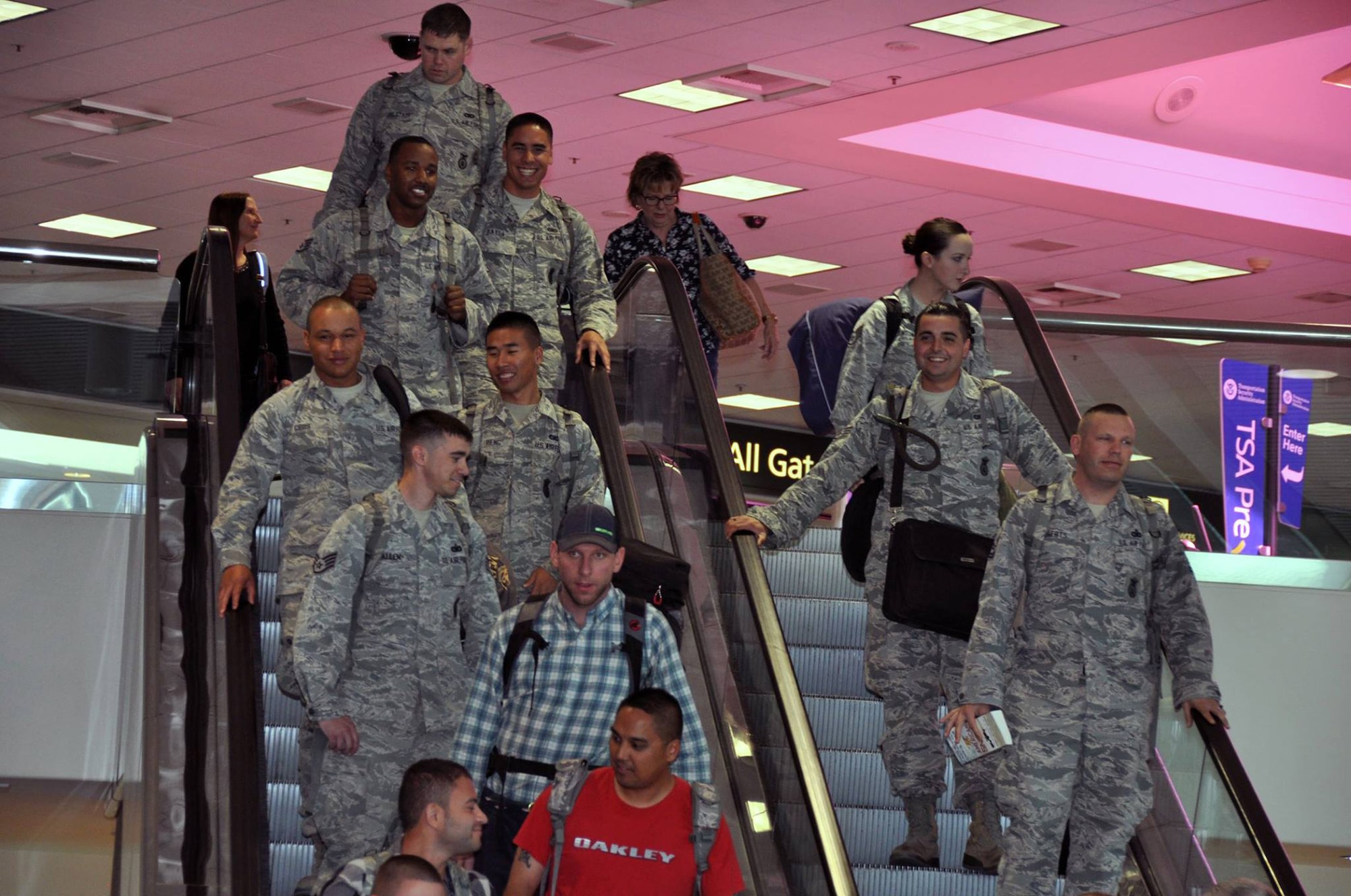 Members of Team Travis, military families and the Patriot Guard Riders of Sacramento welcome Security Forces Defender arriving at to the Sacramento International Airport after six-month deployments to Southwest Asia, May 3, 2015. The returning Airmen were from Travis Air Force Base’s 349th and 60th Security Forces Squadrons. (U.S. Air Force courtesy photo/Staff Sgt. Cindy G. Alejandrez/Released)