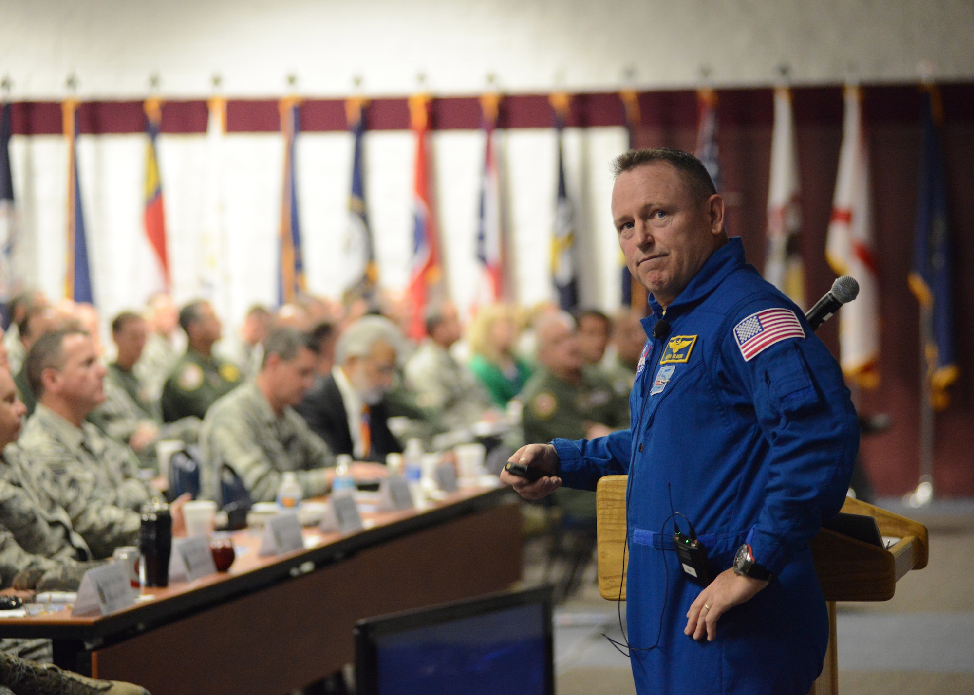 NASA astronaut and US Navy Capt. Barry E. Wilmore talks about his experiences as commander of the International Space Station at the 2015 Air National Guard Executive Safety Summit at Volk Field Combat Readiness Training Center, Wisconsin, May 6, 2015. The conference covers a wide range of topics for ANG senior leaders including safety, resilience, mishap prevention and training. (US Air National Guard photo by Staff Sgt. John E. Hillier/RELEASED)