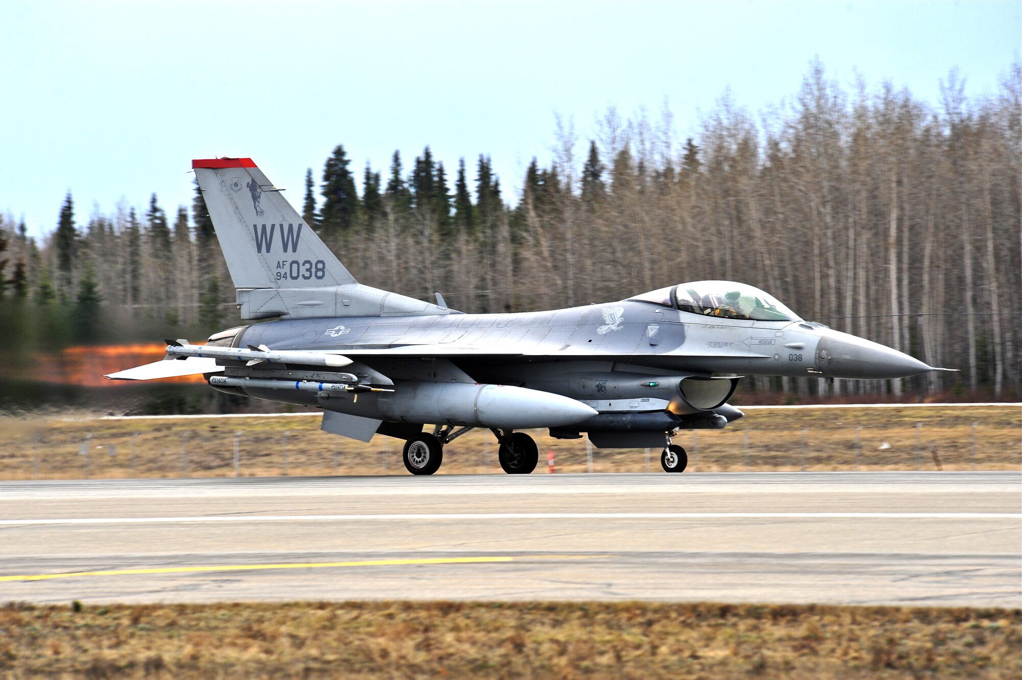 A U.S. Air Force F-16 Fighting Falcon aircraft assigned to the 13th Fighter Squadron, Misawa Air Base, Japan, launches down the runway May 5, 2015, during RED FLAG-Alaska 15-2 at Eielson Air Force Base, Alaska.  The two-week long exercise takes place within the Joint Pacific Alaska Range Complex, a 67,000 square-mile training range. (U.S. Air Force photo by Tech. Sgt. Miguel Lara III/Released)