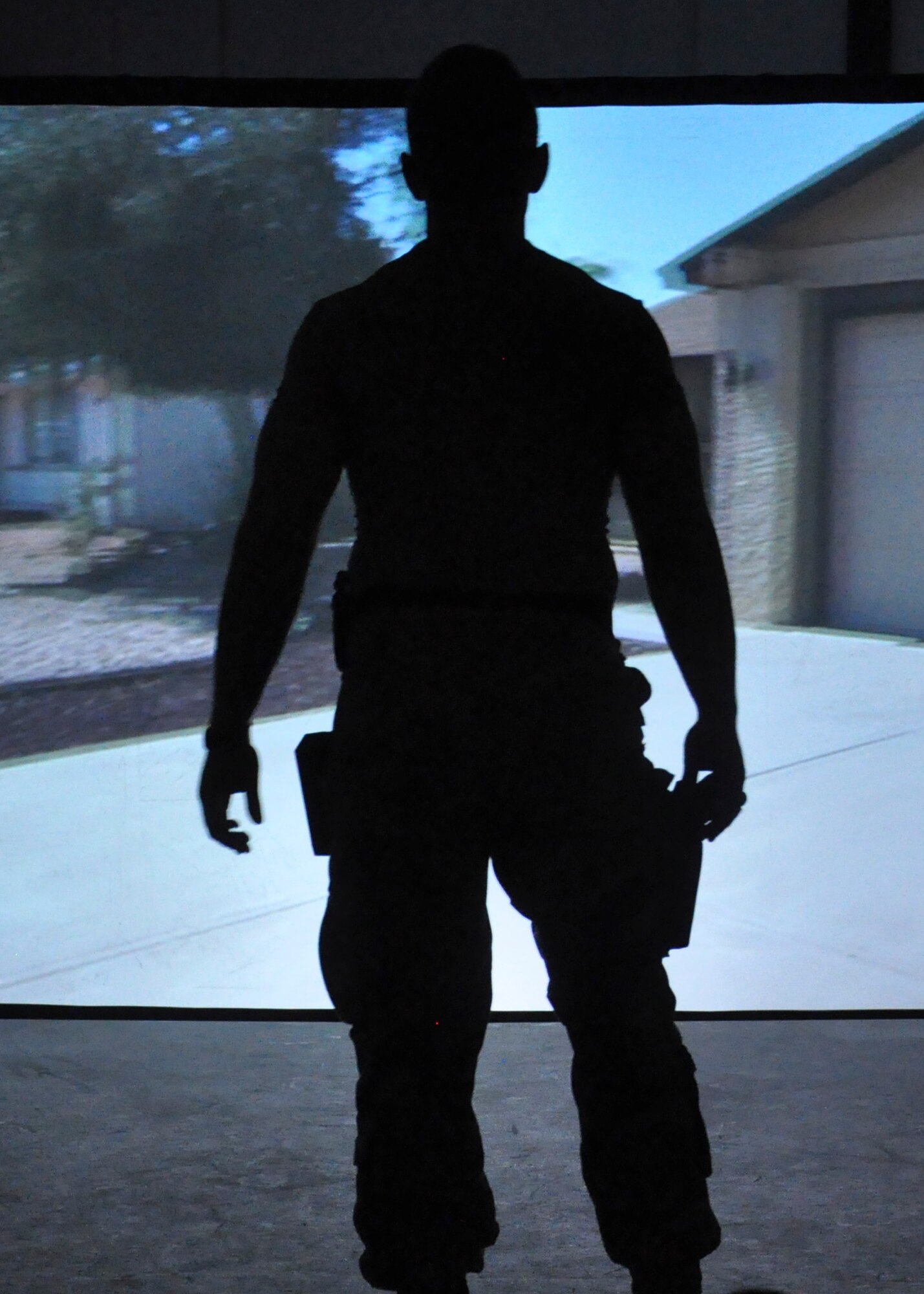 A Cadet from the U.S. Military Academy at West Point navigates a Firearms Training Simulator scenario at Joint Base McGuire-Dix-Lakehurst May 2. The Cadets took part in a two-day Judgment-based Engagement Training course provided by the U.S. Air Force Expeditionary Center Judge Advocate. The 18 West Point Cadets also participated in classroom lectures and action and reaction scenarios to practice making lawful decisions in real-time.(U.S. Air Force photo/Capt. Matthew Chism)