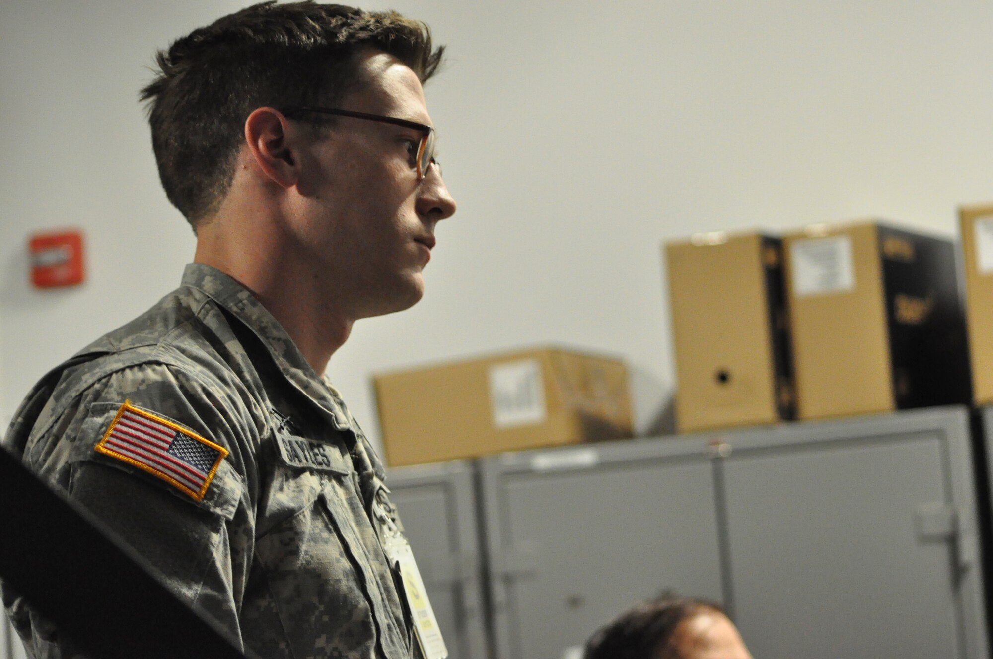 Cadet Daniel Sayles, U.S. Military Academy Class of 2015 from Meriden, Kan., listens to feedback after completing a scenario in a Firearms Training Simulator at Joint Base McGuire-Dix-Lakehurst May 2. West Point Cadets took part in a two-day Judgment-based Engagement Training course provided by the U.S. Air Force Expeditionary Center Judge Advocate. The 18 West Point Cadets also participated in classroom lectures and action and reaction scenarios to practice making lawful decisions in real-time.(U.S. Air Force photo/Capt. Matthew Chism)