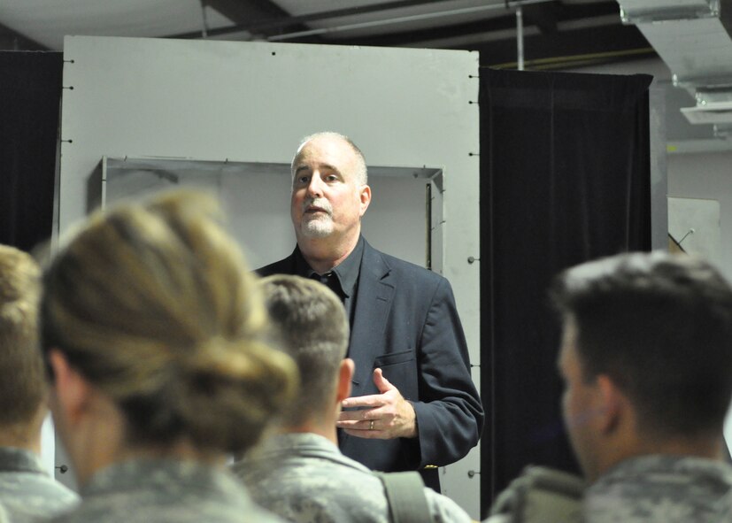 David Bolgiano, a teacher and author on deadly force encounters, provides a pre-brief to U.S. Military Academy Cadets preparing to enter a Firearms Training Simulator May 2. The Cadets participated in a two-day Judgment-based Engagement Training course provided by the U.S. Air Force Expeditionary Center Judge Advocate at Joint Base McGuire-Dix-Lakehurst. The 18 West Point Cadets also participated in classroom lectures and action and reaction scenarios to practice making lawful decisions in real-time.(U.S. Air Force photo/Capt. Matthew Chism)